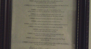 The Resolution - Steve Patterson's signed resolution on the wall with his family pictures.
