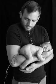 Baby Gives Daddy A Surprise during Photoshoot | Photo by Kirsty Grant/Rex/REX USA (2369451b)