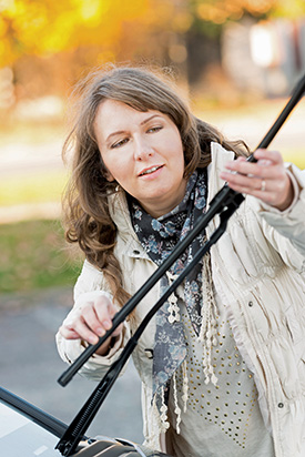 Woman Changing Her Wiper Blades