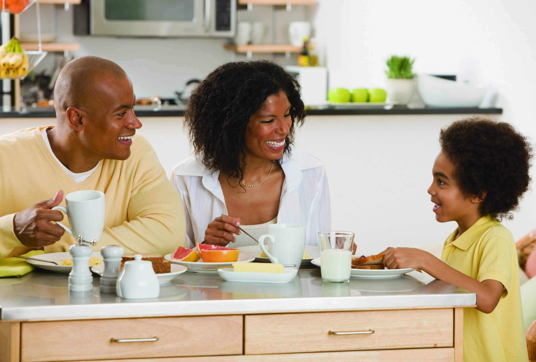 Family eating breakfast. - Food Allergies Can Cause Nutrition Gaps