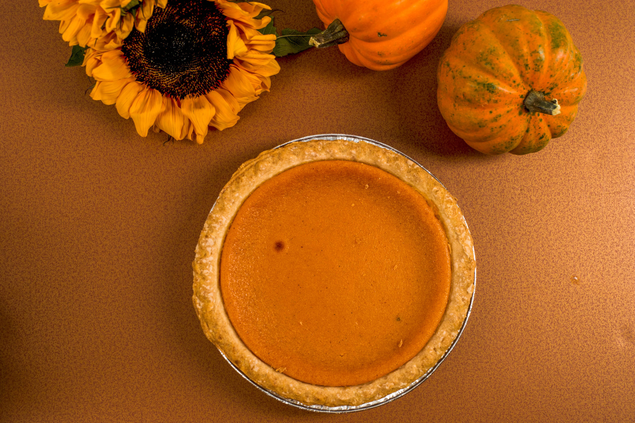 Pumpkin Pie Day - a foodie day set a that delicious fall dessert. Grab you a slice of Pumpkin Pie and top it with some whipped topping. #PumpkinPieDay