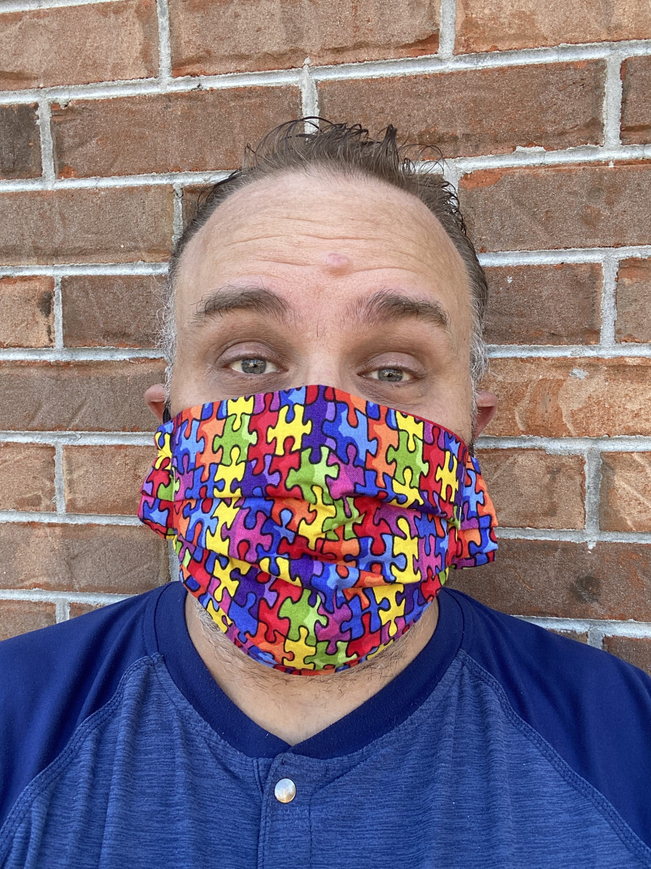 Steve wearing Autism Awareness Face Mask and wearing blue for Autism Awareness Day